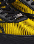 Sneakers nere e gialle Untitled 75