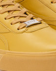 Sneakers elegantes unisex doradas Gold 580