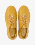 Sneakers elegantes unisex doradas Gold 580