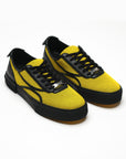 Sneakers nere e gialle Untitled 75