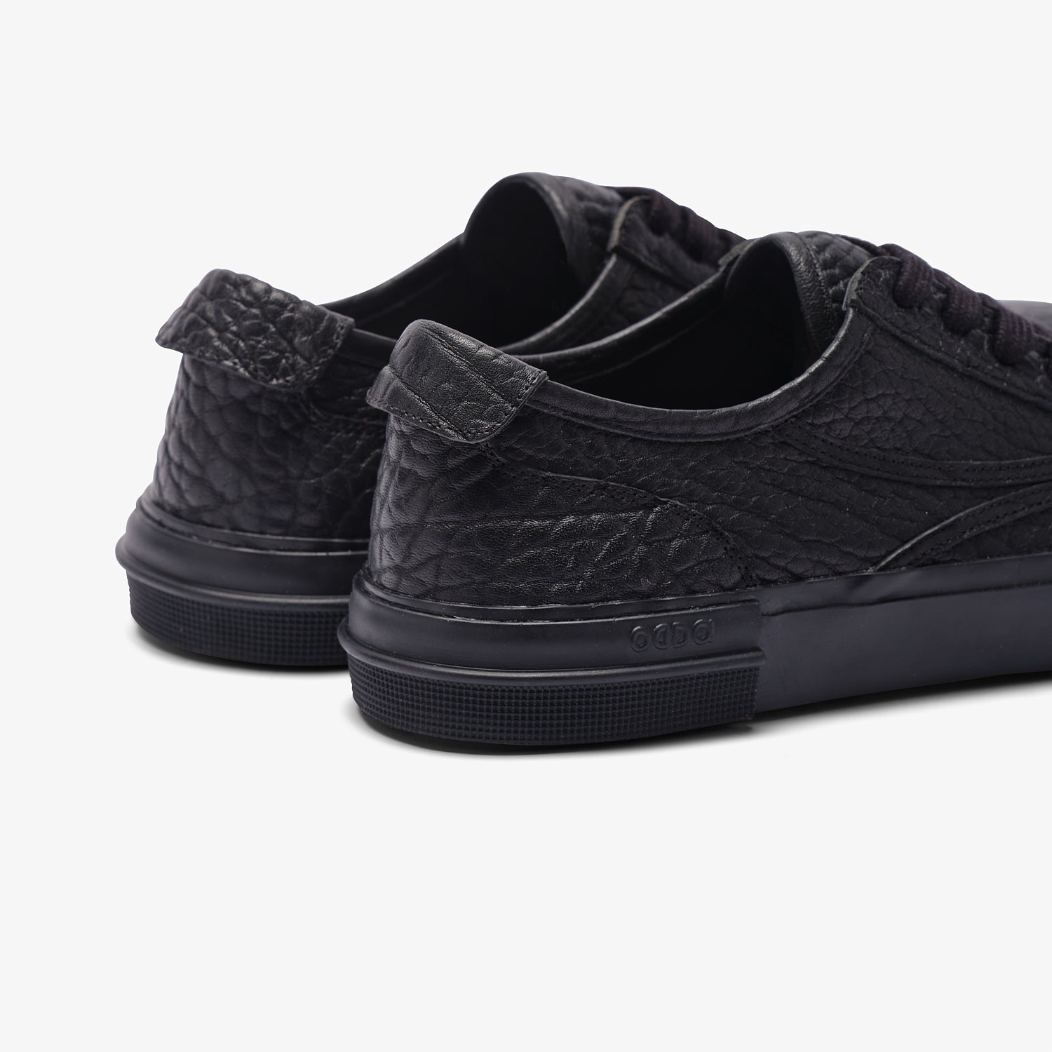 Zapatillas de piel negras para hombre y mujer Obsidian
